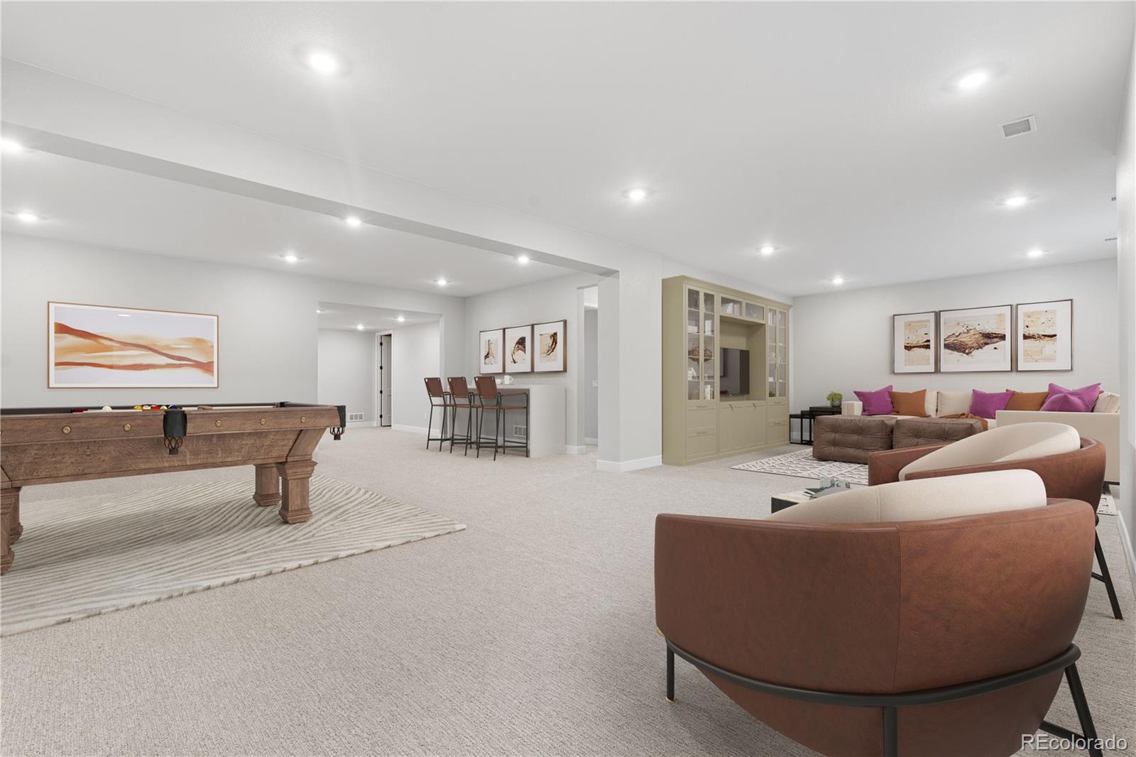 7317 Timberstone Street Castle Pines, CO 80108 - Photo 27 of 49 a living room with furniture and a flat screen tv