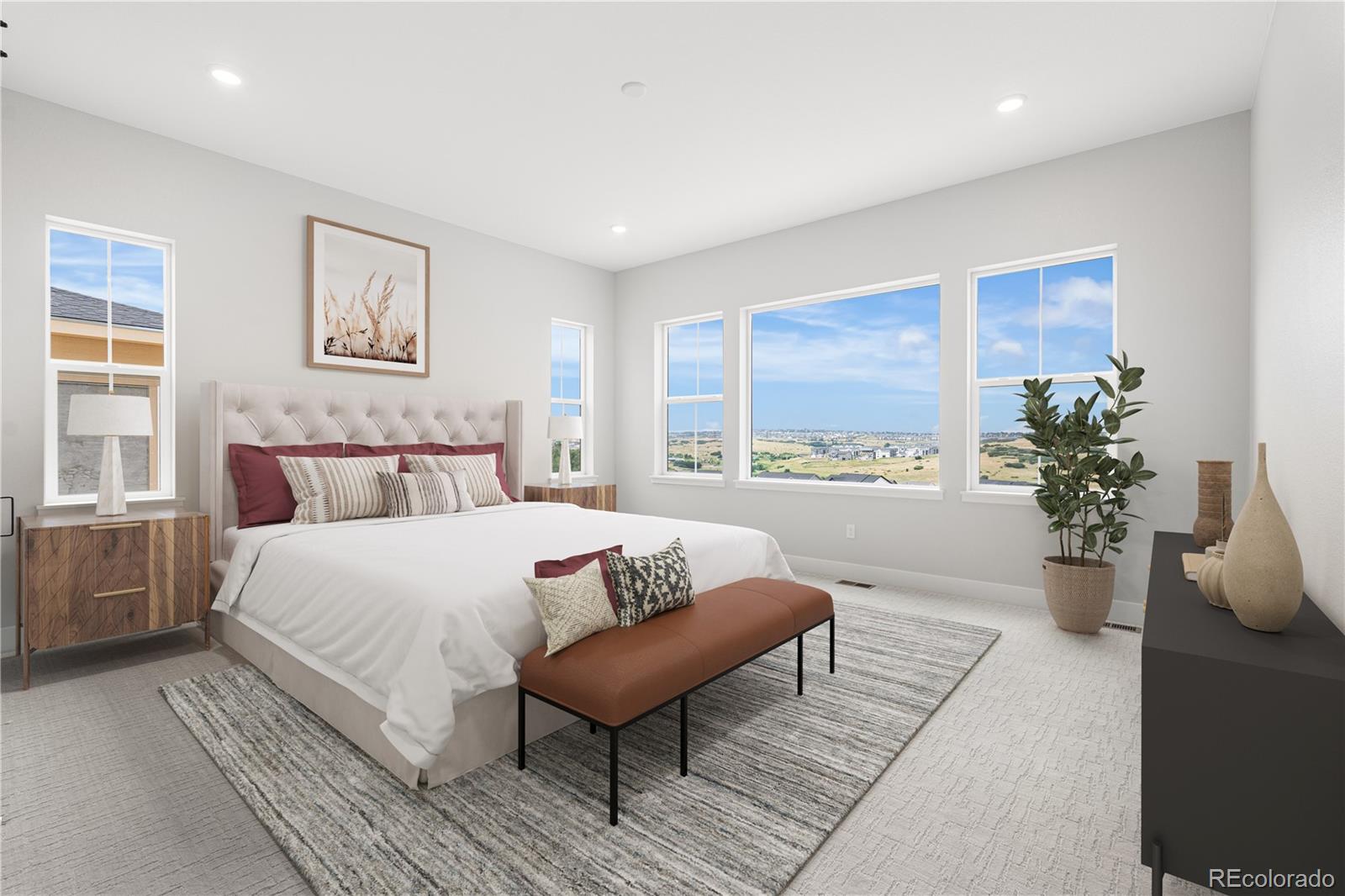 7317 Timberstone Street Castle Pines, CO 80108 - Photo 37 of 49 a bedroom with a large bed and a couch