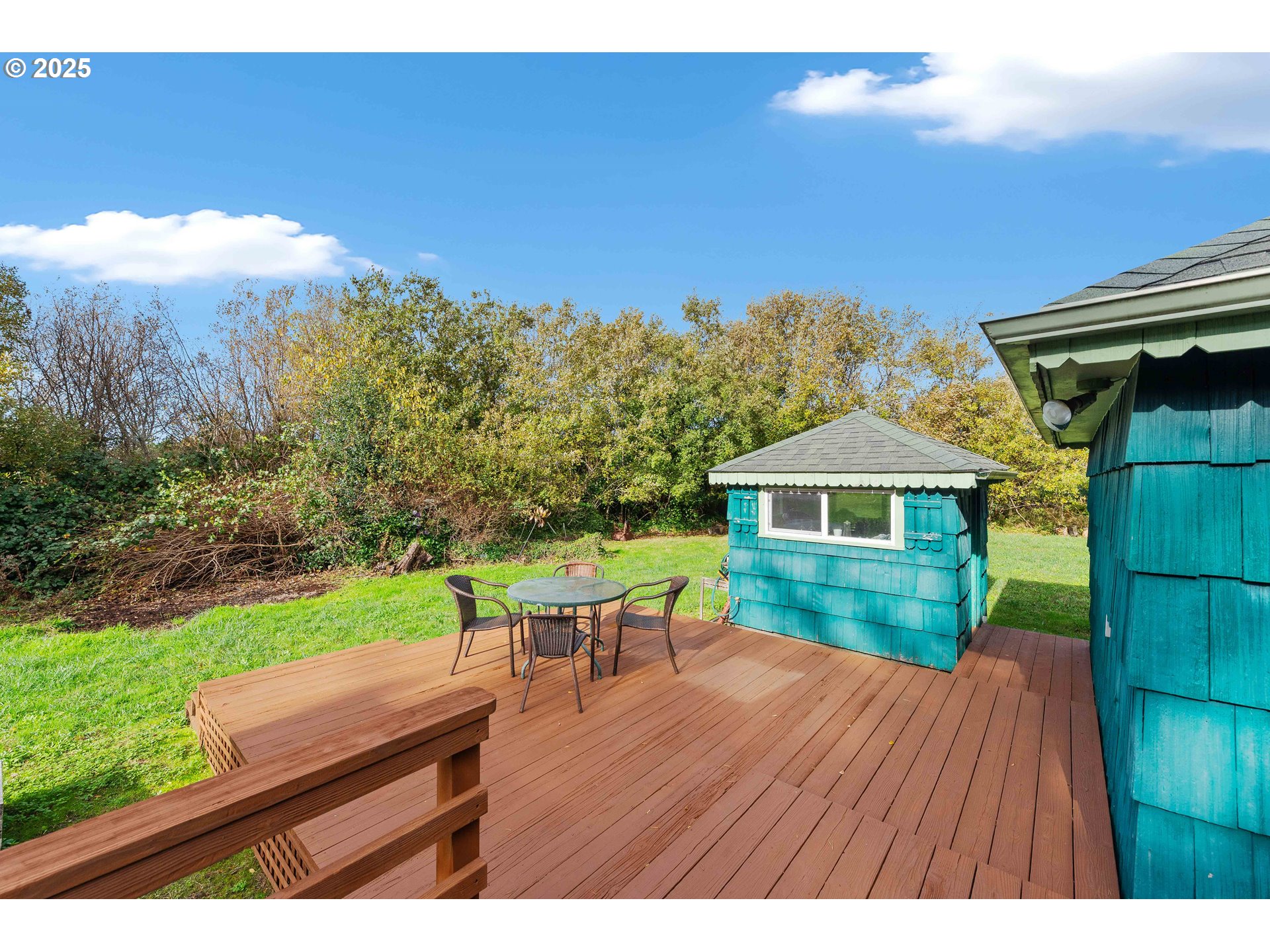 54568 Beach Loop Road Bandon, OR 97411 - Photo 17 of 38 a view of a house with backyard and sitting area