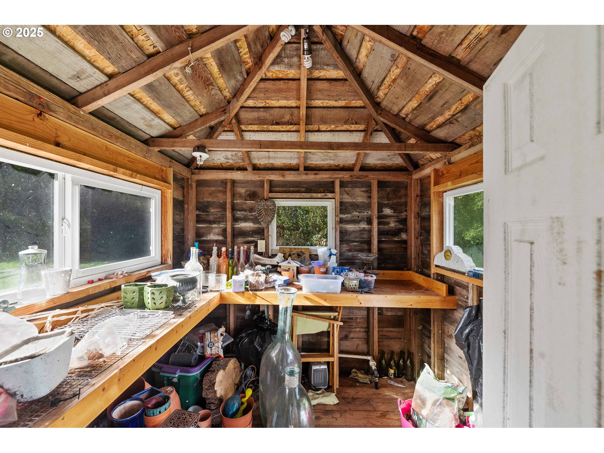 54568 Beach Loop Road Bandon, OR 97411 - Photo 22 of 38 a outdoor living space with furniture and a potted plant