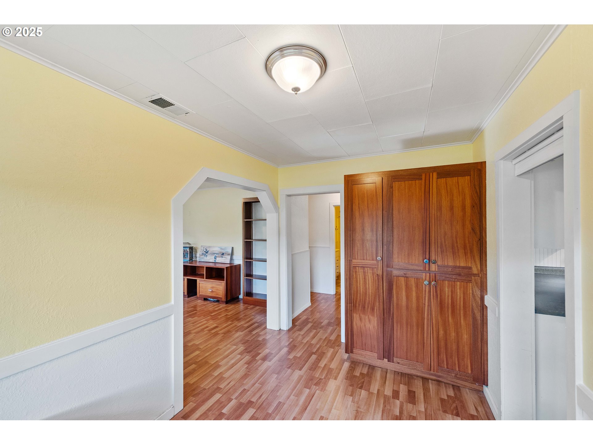 54568 Beach Loop Road Bandon, OR 97411 - Photo 28 of 38 a view interior of house and hall with wooden floor