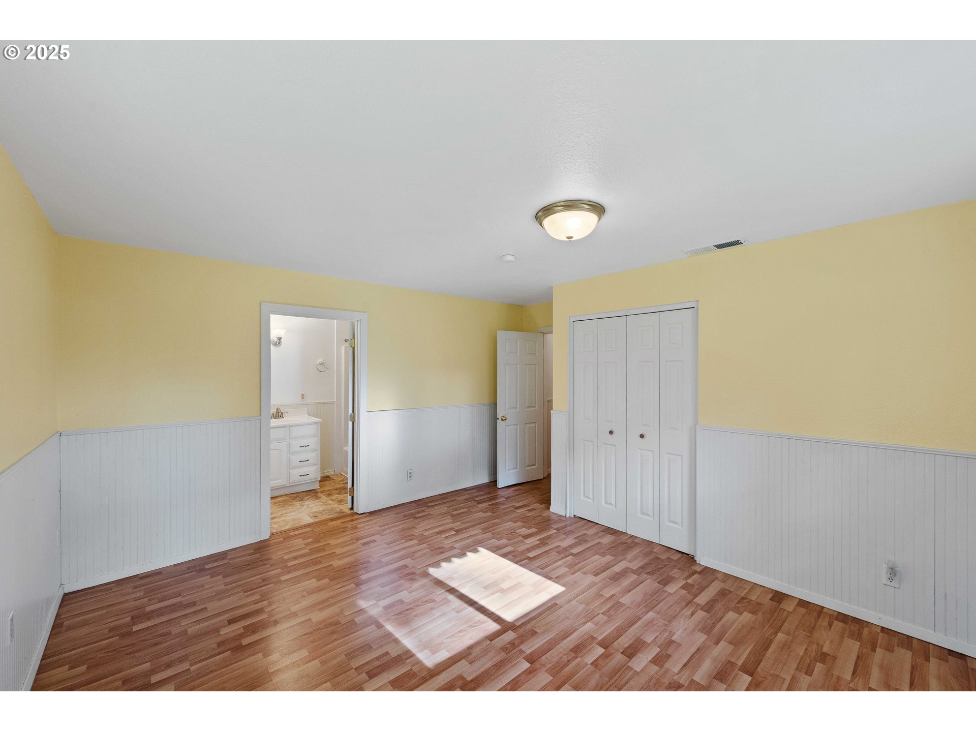 54568 Beach Loop Road Bandon, OR 97411 - Photo 38 of 38 a view of an empty room and wooden floor