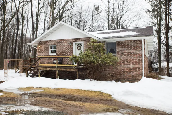 front view of house with a yard