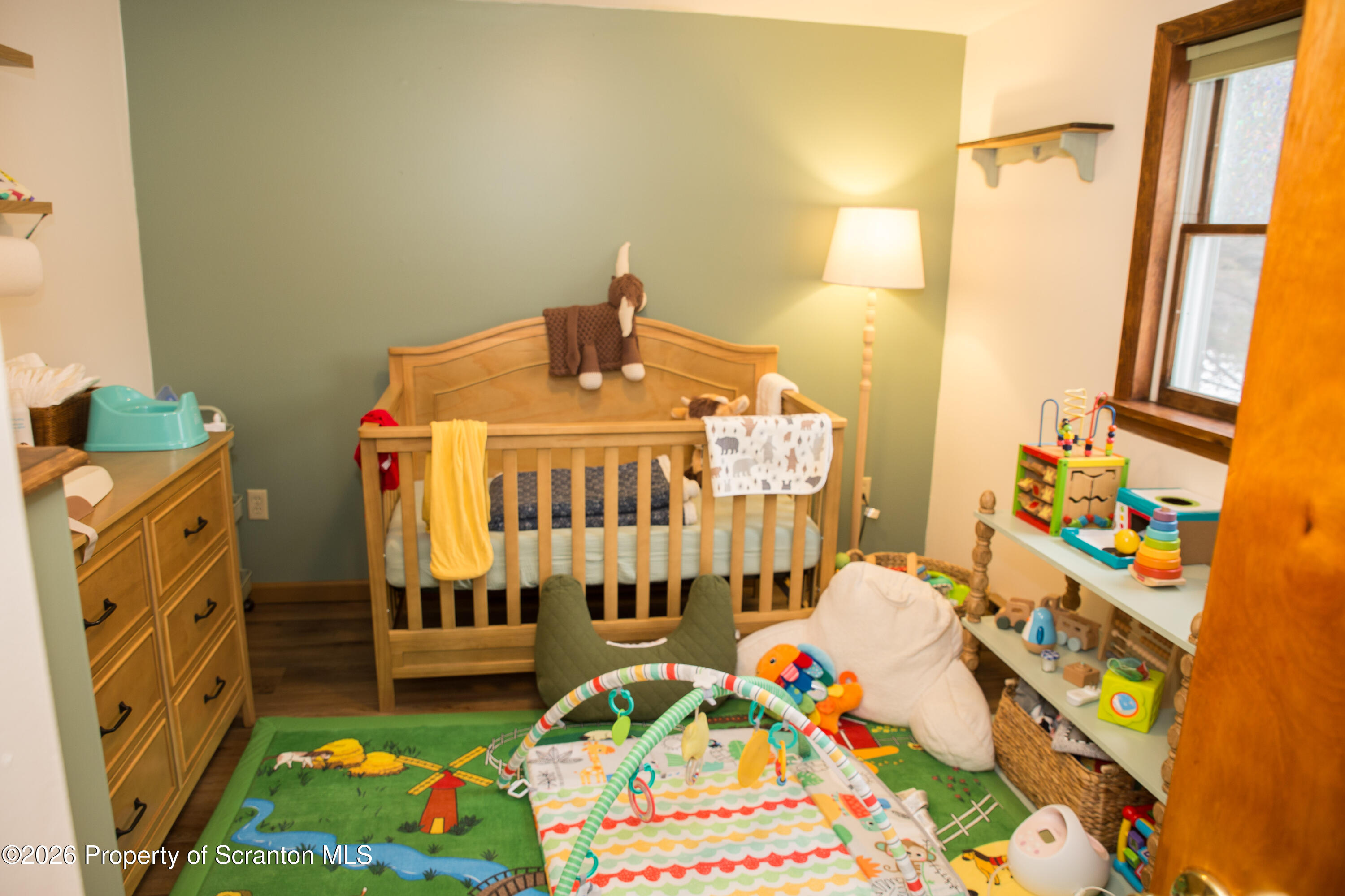 5411 Bloomington Road Moscow, PA 18444 - Photo 4 of 7 a bedroom with baby crib and a baby crib