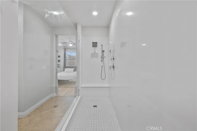 a bathroom with a shower and a toilet