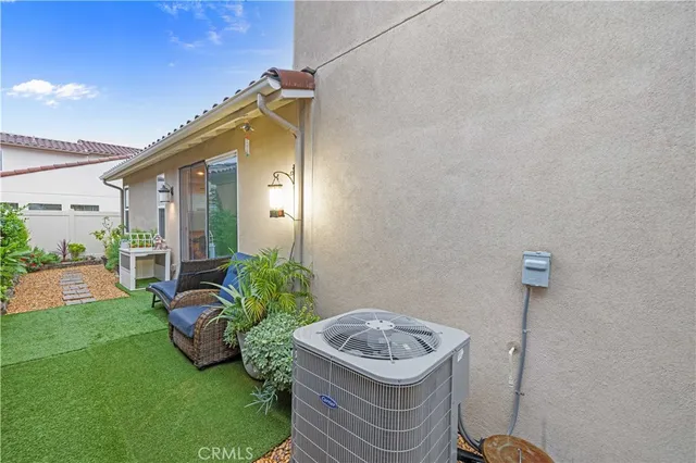 a house with garden in front of it