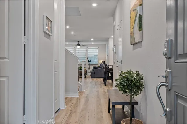 a view of a hallway with seating area