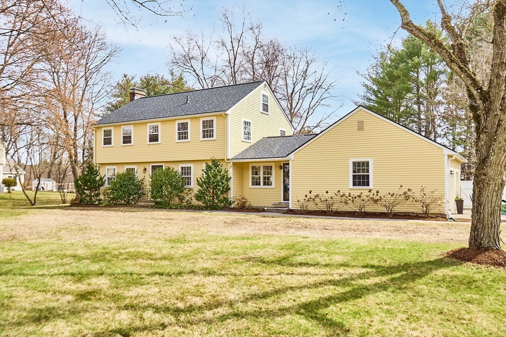 551 Barretts Mill Road Concord, MA 01742 - Photo 35 of 36 a view of a yard in front of a house with a yard