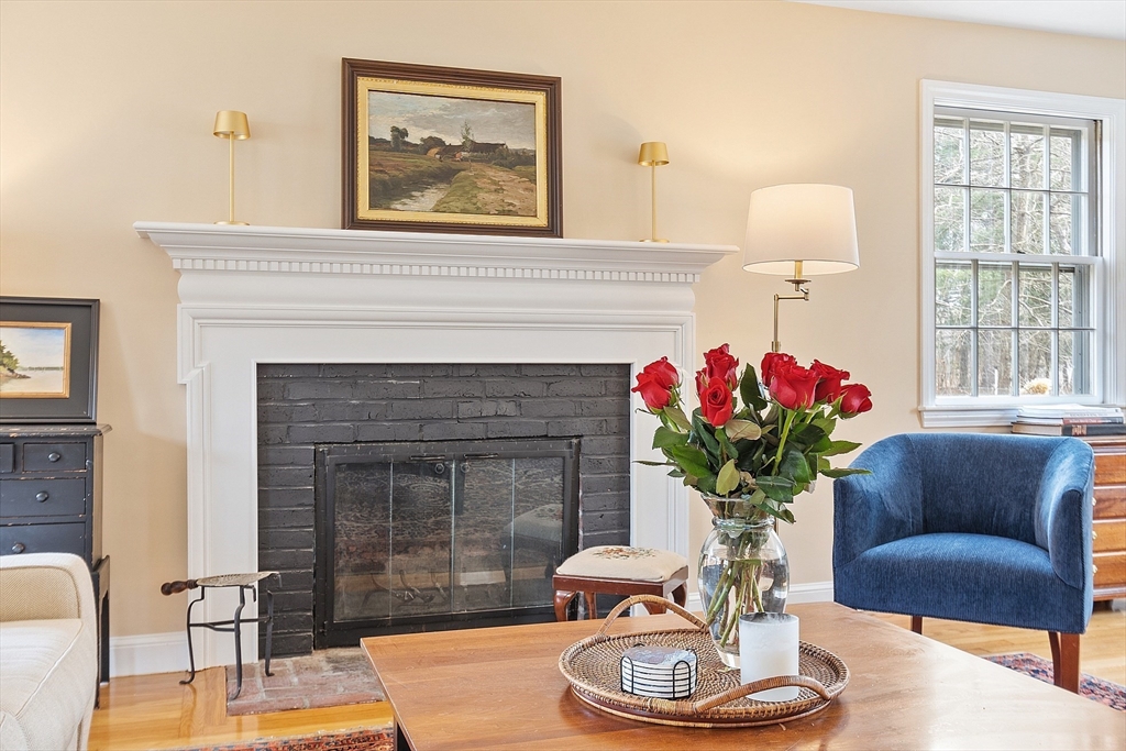 551 Barretts Mill Road Concord, MA 01742 - Photo 5 of 36 a living room with furniture and a fireplace