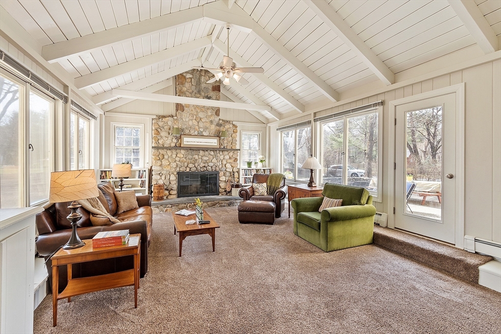 551 Barretts Mill Road Concord, MA 01742 - Photo 10 of 36 a living room with furniture and a large window