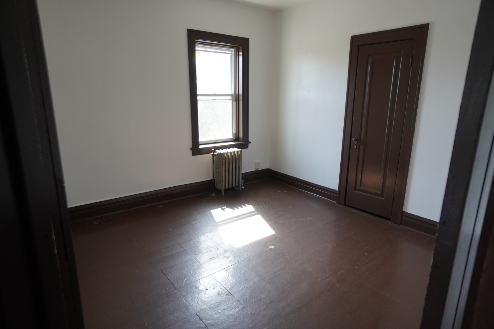 1170 Connecticut Street, Unit 2 Gary, IN 46407 - Photo 6 of 9 an empty room with windows and closet