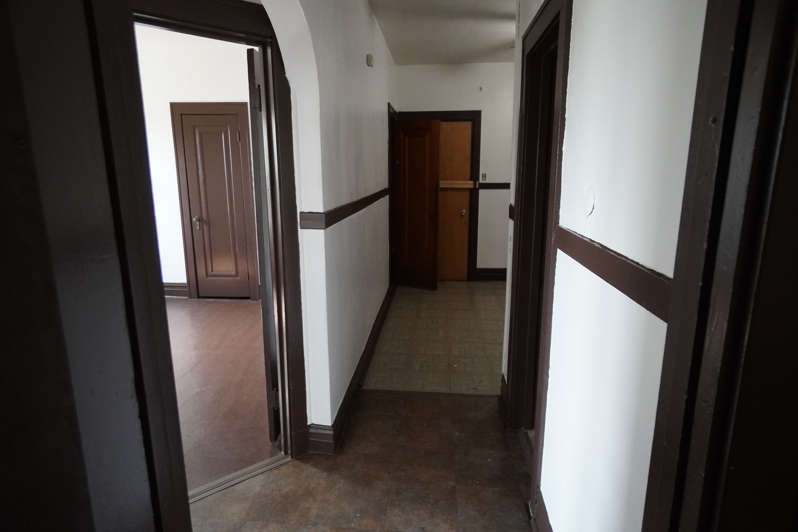 1170 Connecticut Street, Unit 2 Gary, IN 46407 - Photo 7 of 9 a view of a hallway with wooden floor
