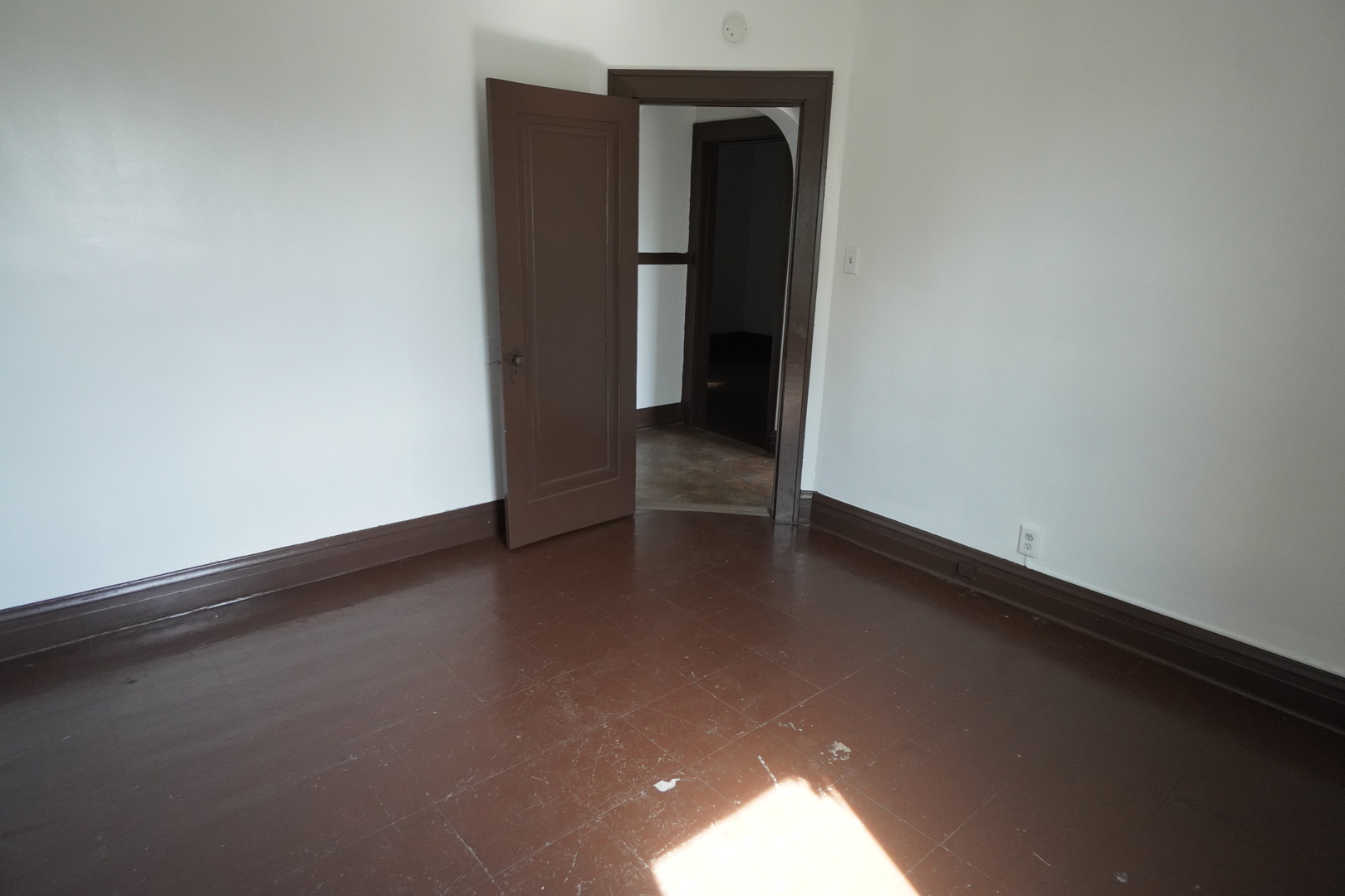 1170 Connecticut Street, Unit 2 Gary, IN 46407 - Photo 8 of 9 a view of empty room with wooden floor