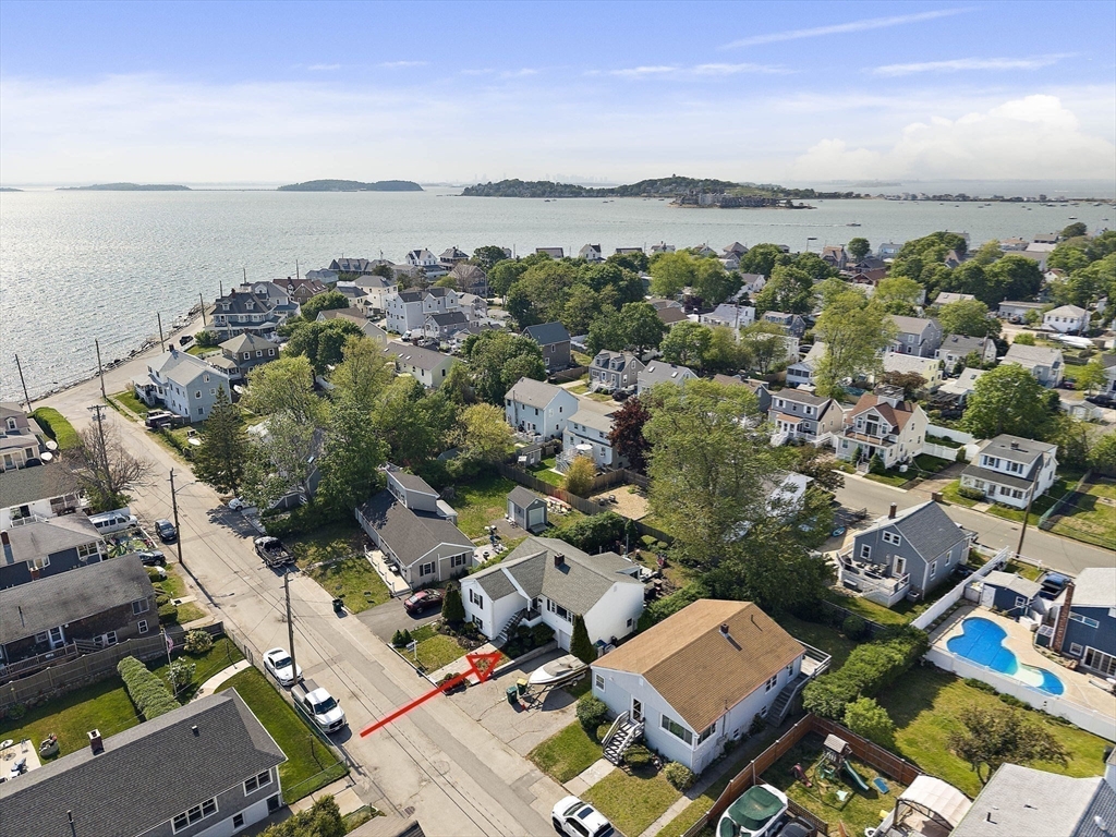 15 D Street Hull, MA 02045 - Photo 10 of 42 an aerial view of a city with lots of residential buildings and lake view in back