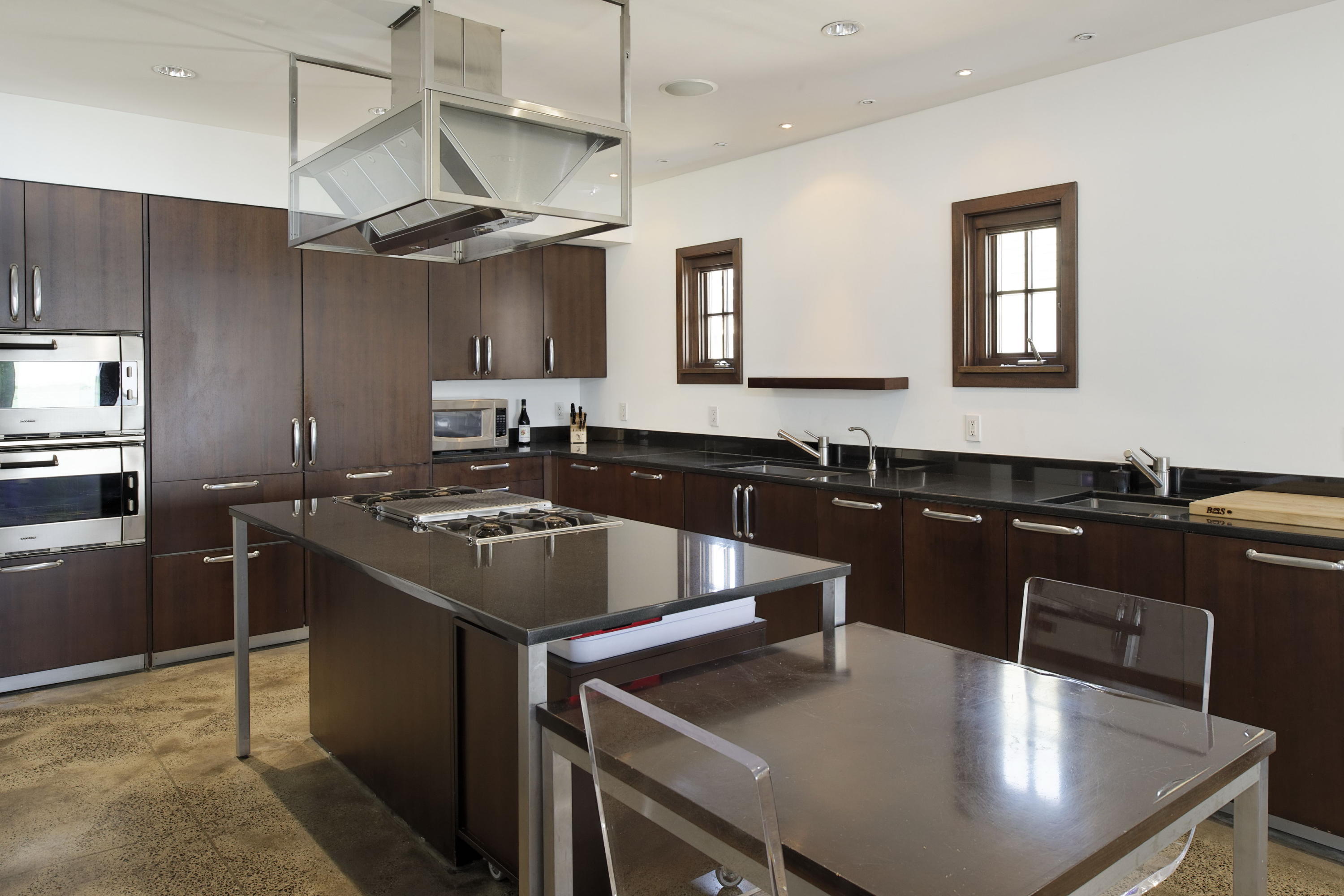 1-2 Rocky Point Road Rowayton, CT 06853 - Photo 12 of 35 a kitchen with a stove a sink and a refrigerator
