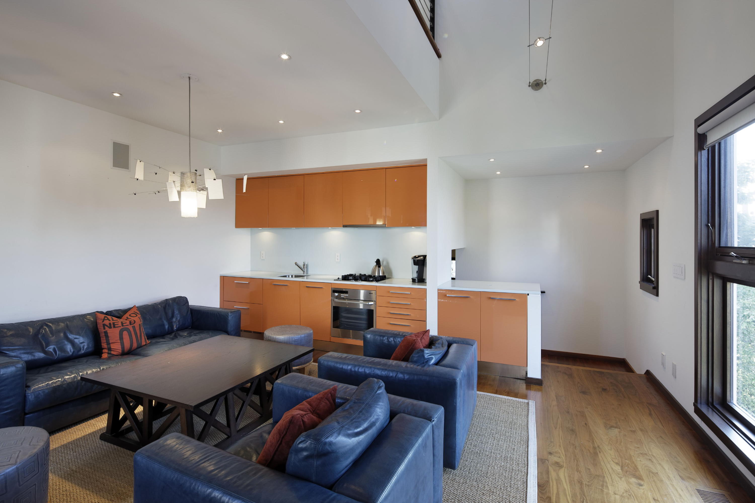 1-2 Rocky Point Road Rowayton, CT 06853 - Photo 21 of 35 a view of a livingroom with furniture and a flat screen tv
