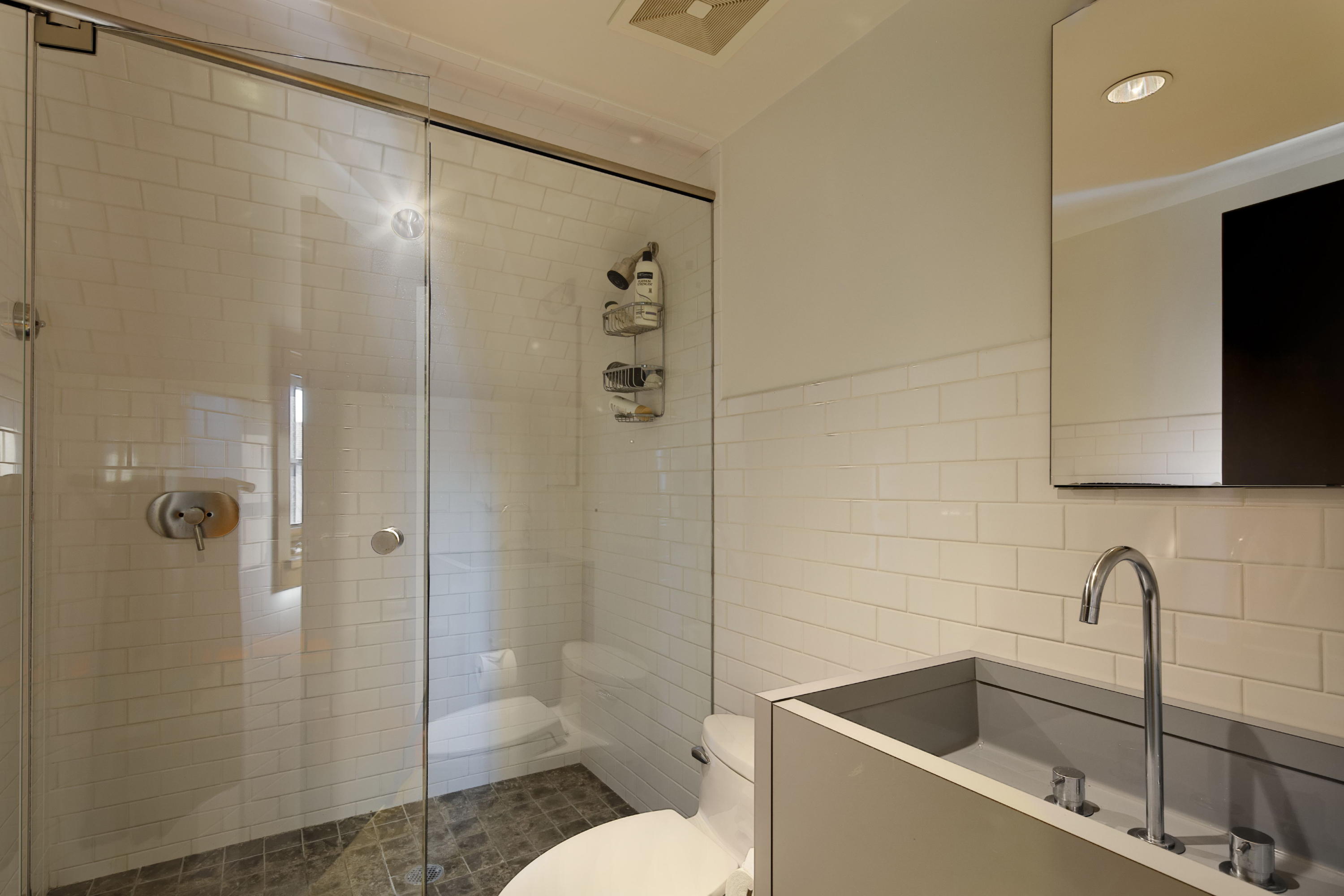 1-2 Rocky Point Road Rowayton, CT 06853 - Photo 25 of 35 a bathroom with a shower toilet and sink