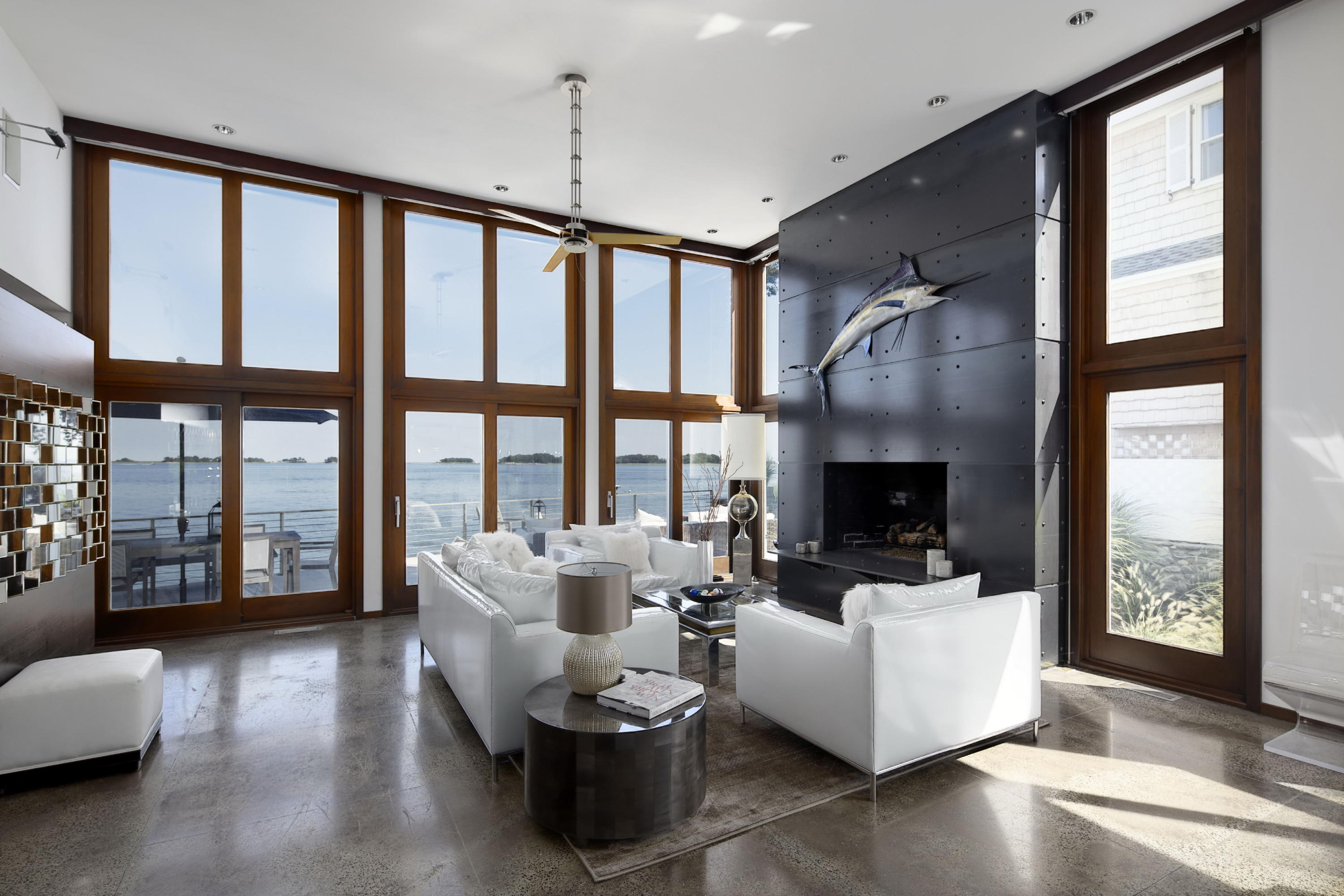 1-2 Rocky Point Road Rowayton, CT 06853 - Photo 4 of 35 a living room with furniture and floor to ceiling windows