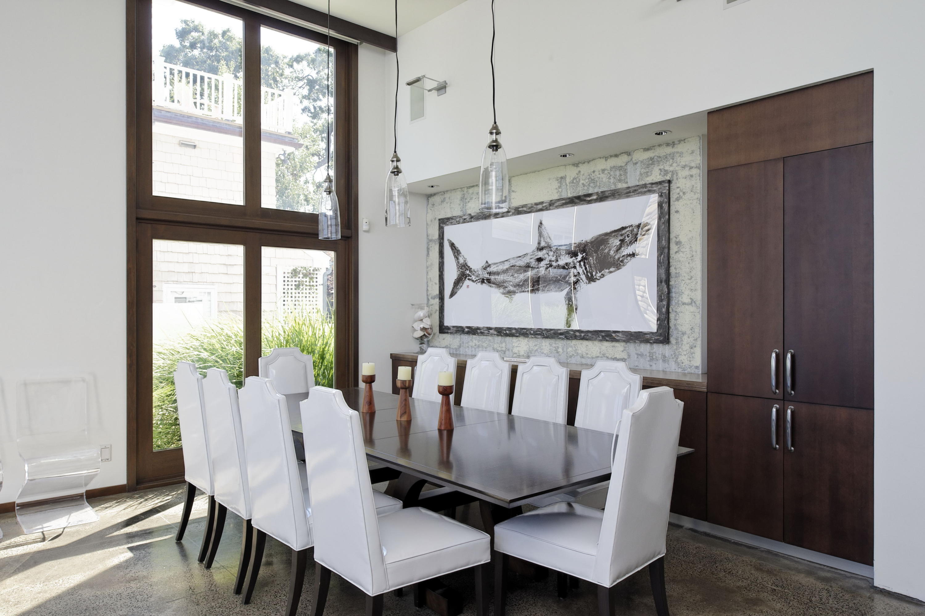 1-2 Rocky Point Road Rowayton, CT 06853 - Photo 10 of 35 a view of a dining room with furniture large window and wooden floor