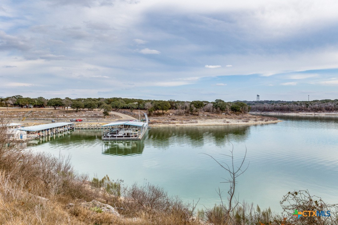 4 North Walnut Court Morgan's Point Resort, TX 76513 - Photo 8 of 9 a view of a lake with houses in the back