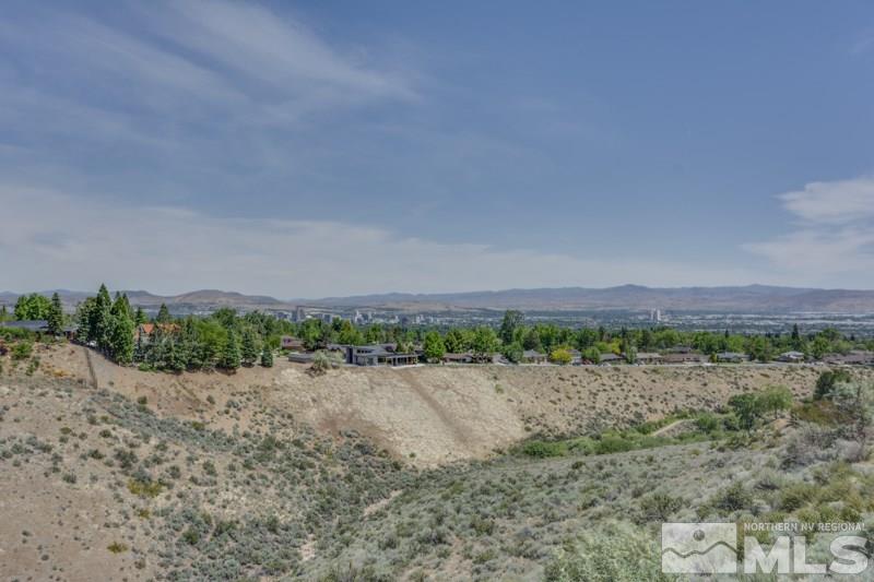 2245 Wide Horizon Drive Reno, NV 89509 - Photo 23 of 25 a view of a lake and mountain in the back