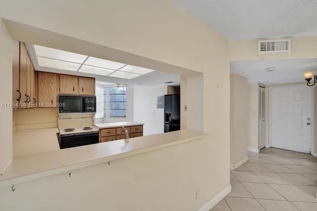$255,000 | 9520 Seagrape Drive, Unit 306, Davie, FL 33324