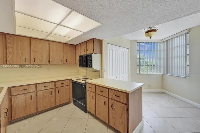 $255,000 | 9520 Seagrape Drive, Unit 306, Davie, FL 33324