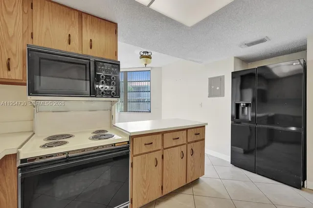 $255,000 | 9520 Seagrape Drive, Unit 306, Davie, FL 33324