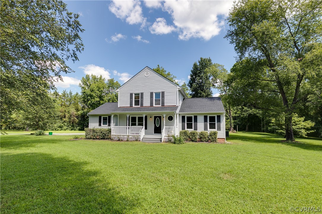 9641 Pasture Hill Road Midlothian, VA 23112 - Photo 1 of 30 a front view of a house with a garden