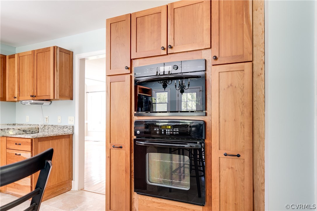 9641 Pasture Hill Road Midlothian, VA 23112 - Photo 12 of 30 a kitchen with stainless steel appliances granite countertop a stove and a refrigerator with cabinets