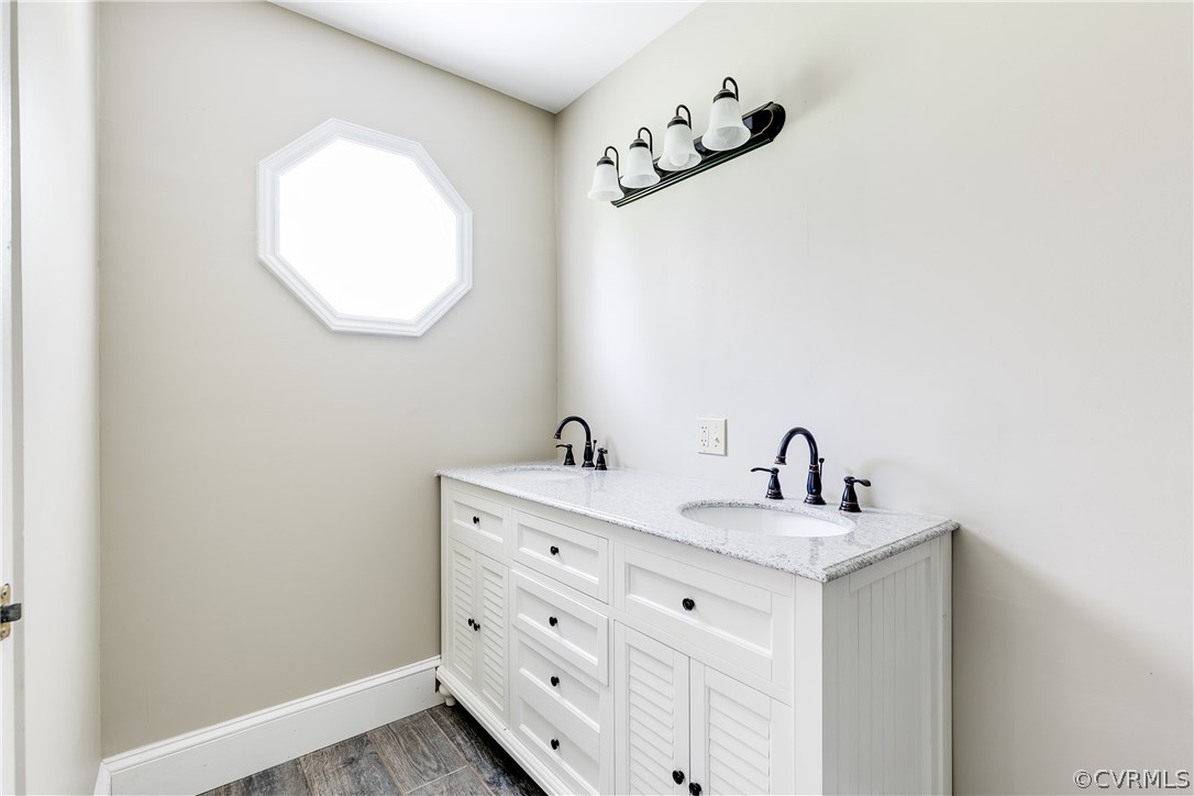 9641 Pasture Hill Road Midlothian, VA 23112 - Photo 18 of 30 a bathroom with a sink and a mirror