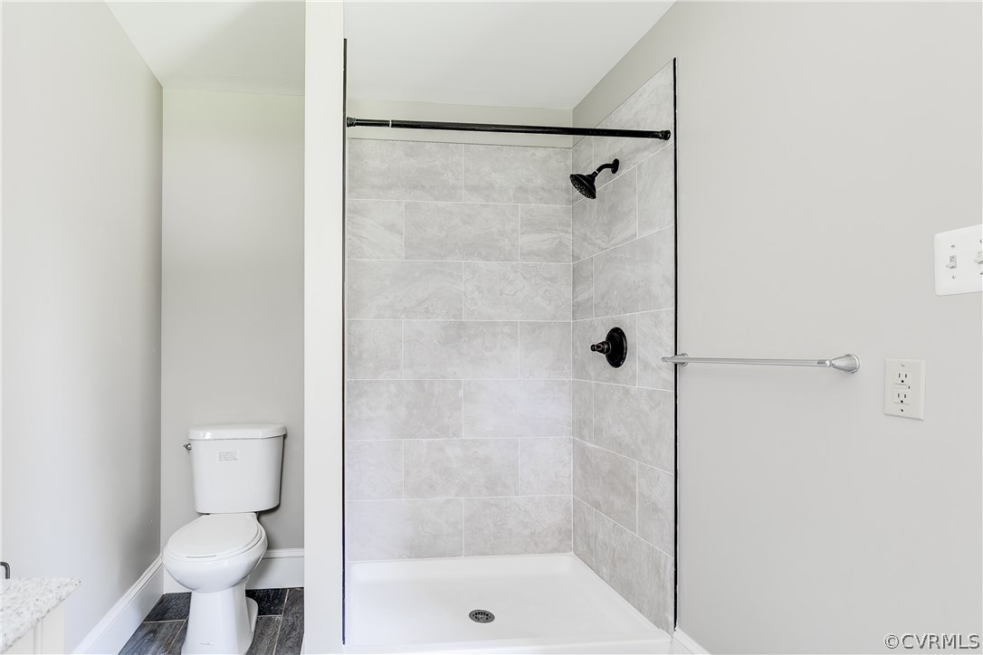 9641 Pasture Hill Road Midlothian, VA 23112 - Photo 19 of 30 a bathroom with a shower and toilet