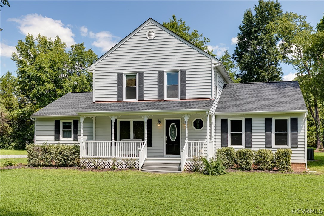 9641 Pasture Hill Road Midlothian, VA 23112 - Photo 2 of 30 a front view of a house with a yard
