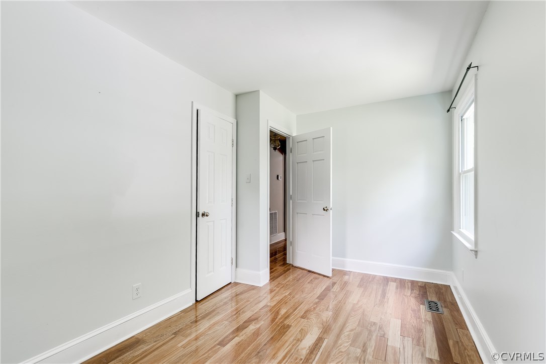 9641 Pasture Hill Road Midlothian, VA 23112 - Photo 21 of 30 a view of an empty room and wooden floor