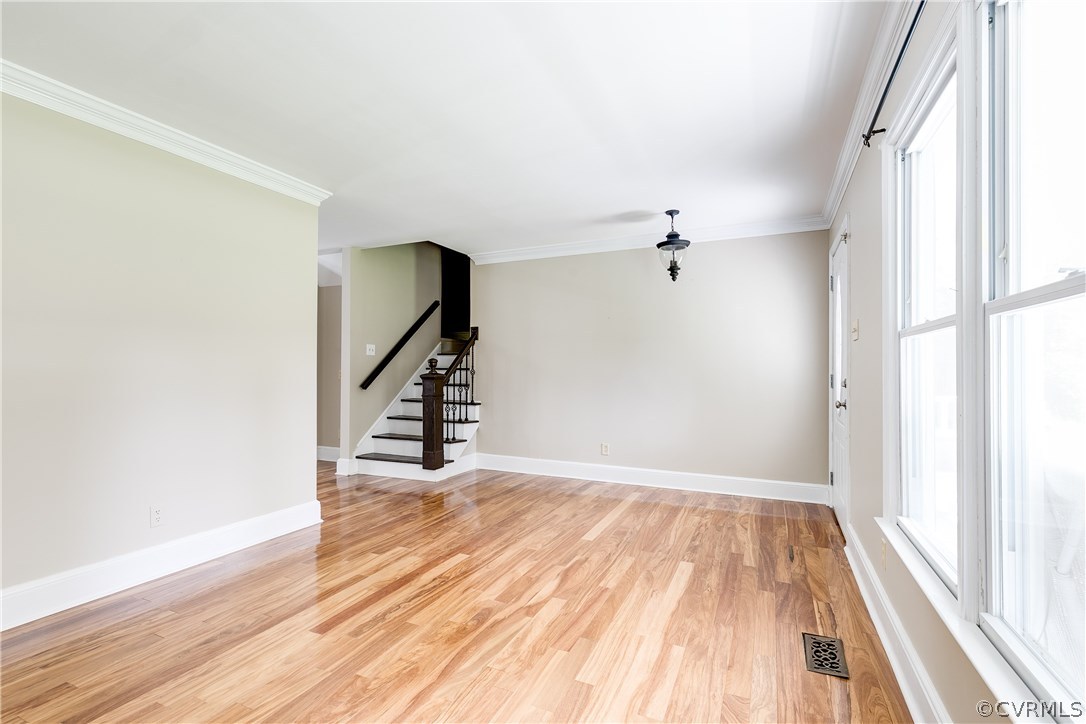9641 Pasture Hill Road Midlothian, VA 23112 - Photo 9 of 30 a view of a hallway view with wooden floor and staircase