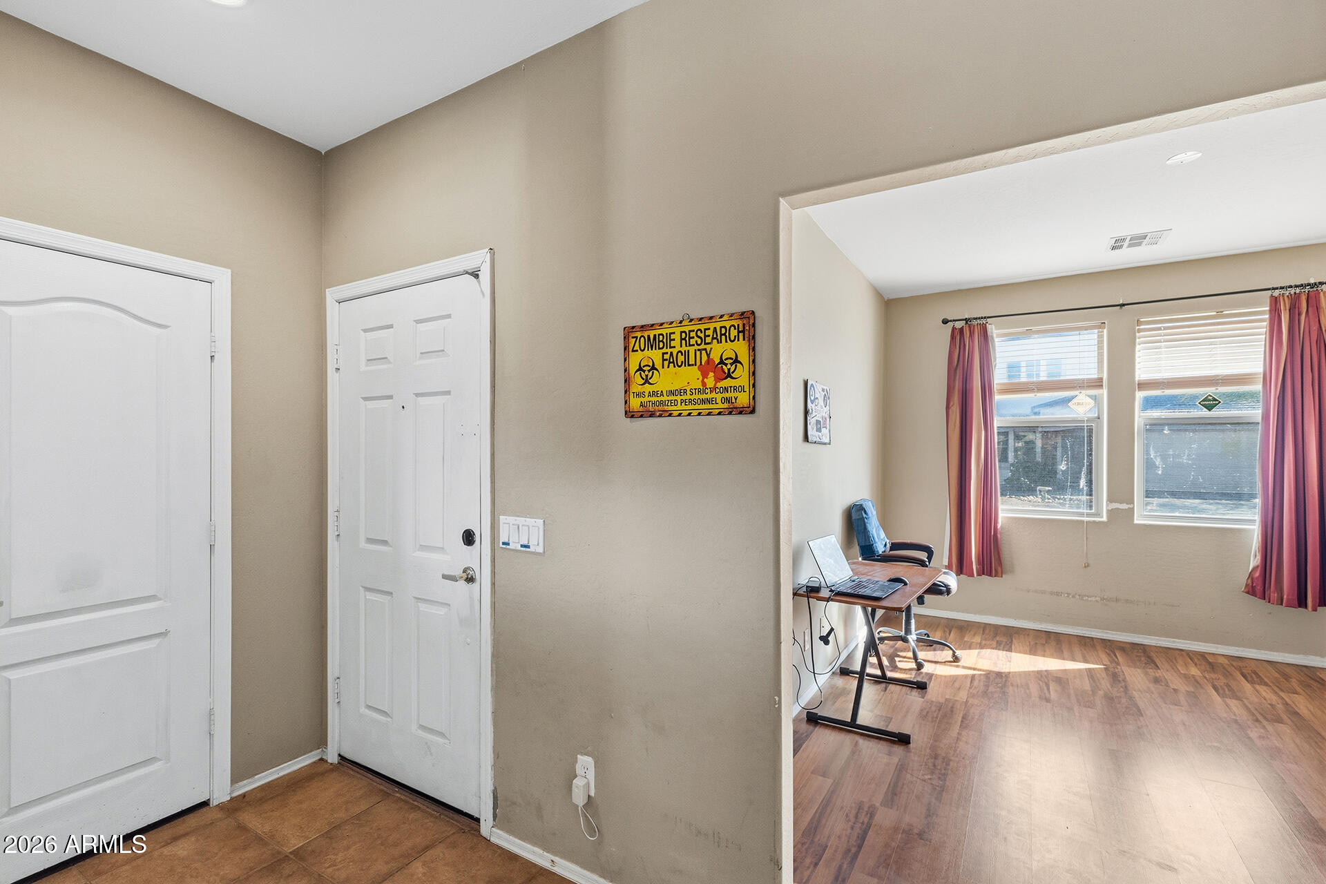 6718 West Darrel Road Laveen, AZ 85339 - Photo 27 of 49 a view of a room with gym equipment and a window