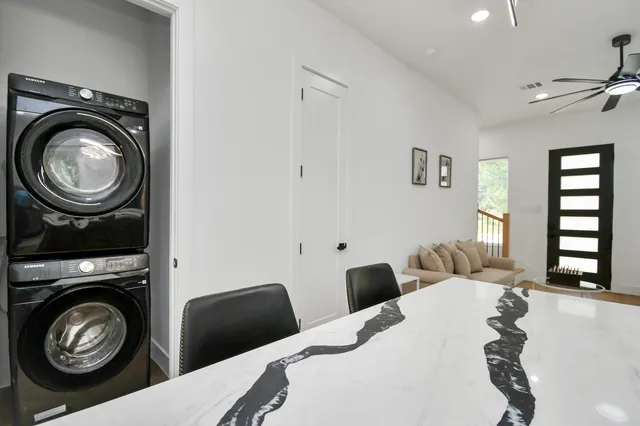 a bathroom with a sink vanity and a mirror