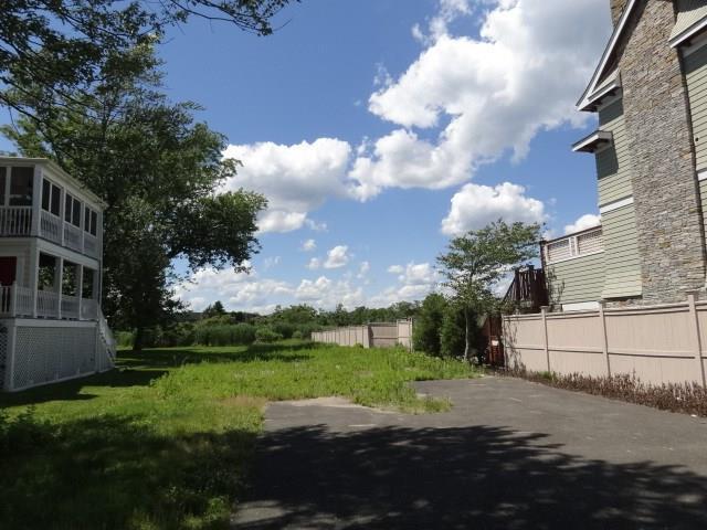 1008 Fairfield Beach Road Fairfield, CT 06824 - Photo 1 of 1 a view of a house with a yard