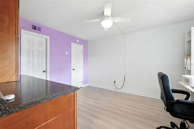 a view of a livingroom with furniture