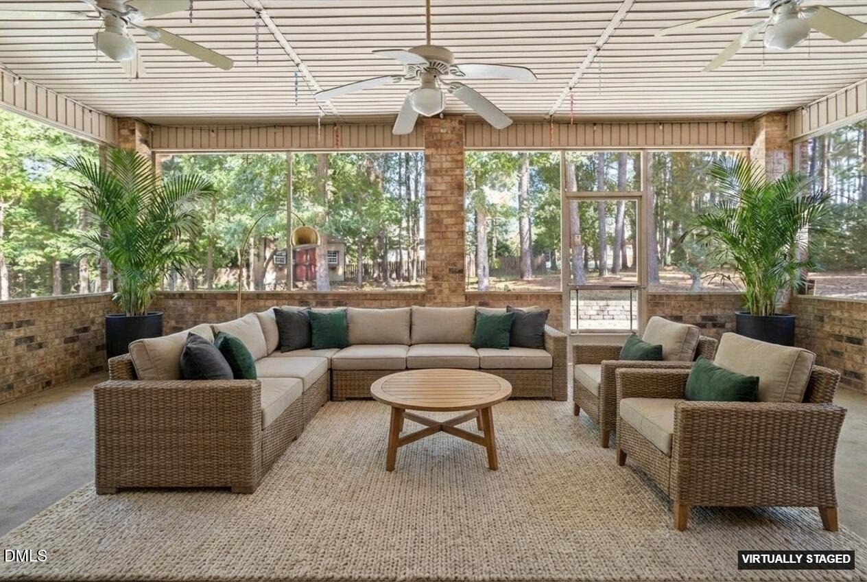 46 Spring Haven Lane Willow Spring, NC 27592 - Photo 27 of 50 Screened porch staged