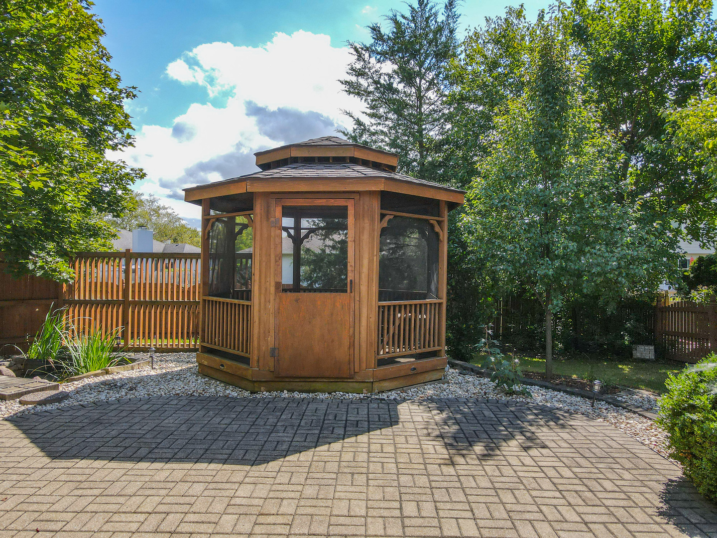 304 Andrea Drive Manhattan, IL 60442 - Photo 12 of 53 a front view of a house with garden