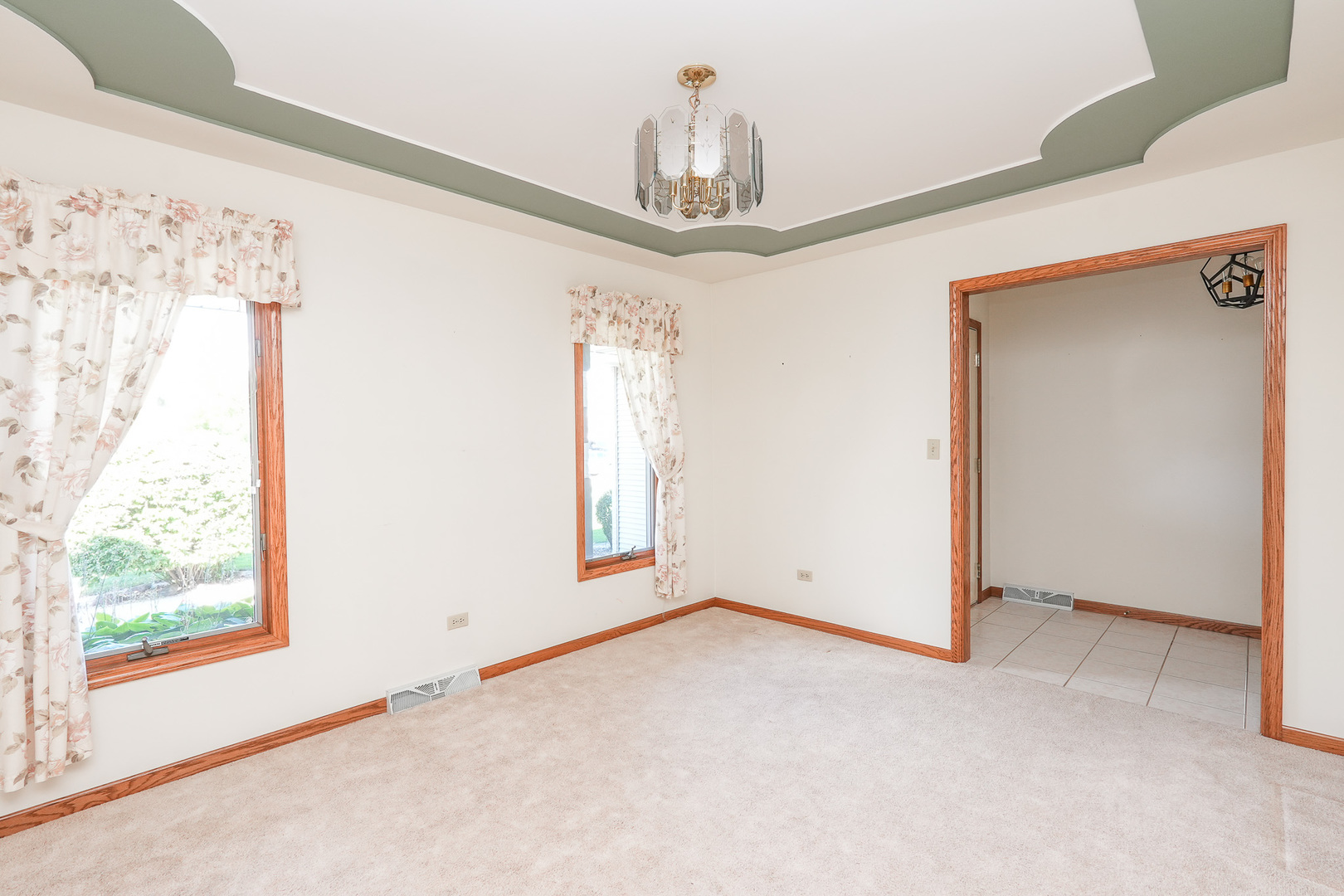 304 Andrea Drive Manhattan, IL 60442 - Photo 21 of 53 an empty room with windows