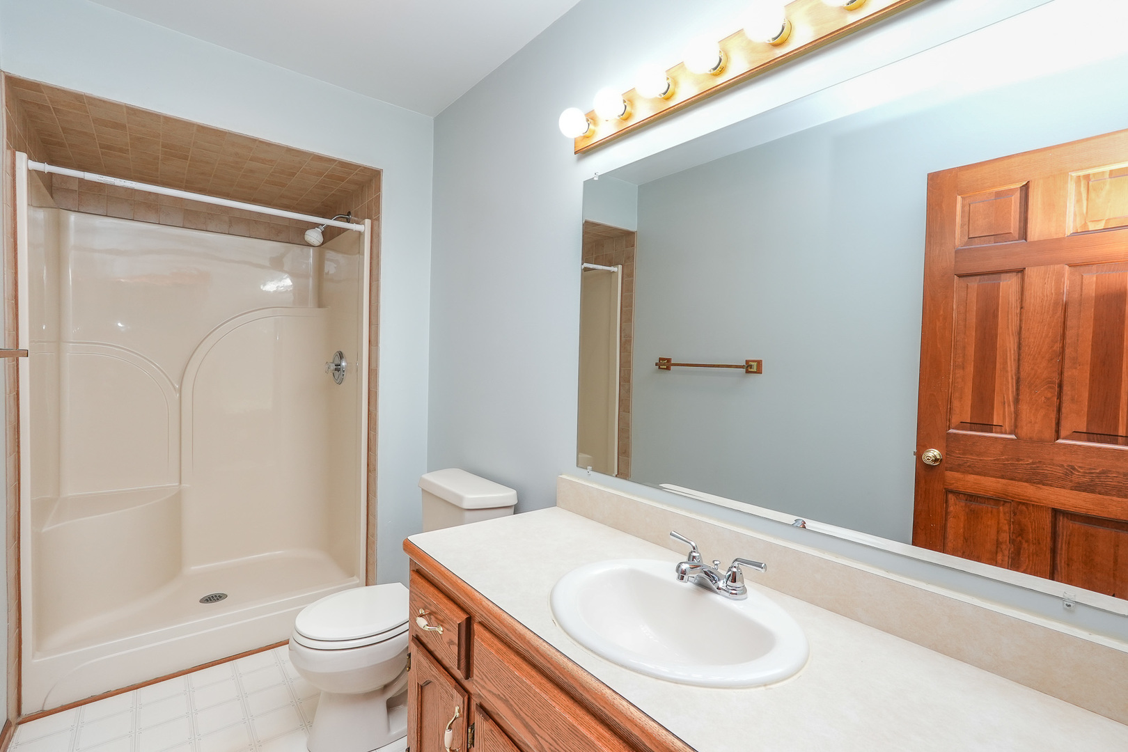304 Andrea Drive Manhattan, IL 60442 - Photo 39 of 53 a bathroom with a sink toilet and shower