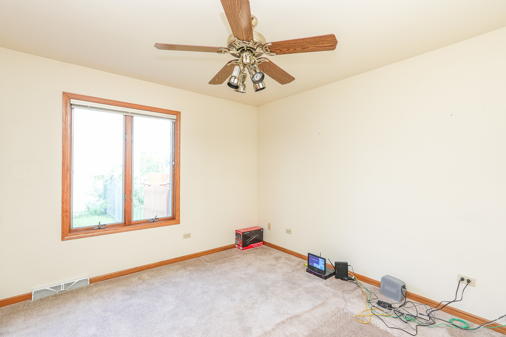 304 Andrea Drive Manhattan, IL 60442 - Photo 42 of 53 a view of a workspace with furniture and a window