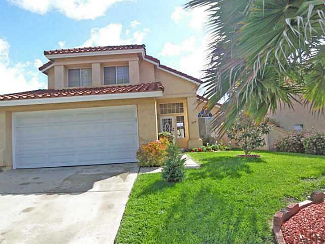 1630 Promontory Ridge Way Vista, CA 92081 - Photo 13 of 13 Front view of the home. Not only a two car attached garage but a good size driveway for additional parking.