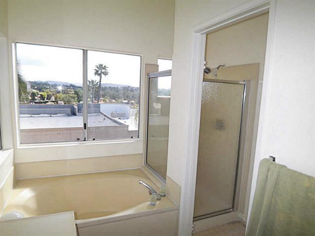 1630 Promontory Ridge Way Vista, CA 92081 - Photo 9 of 13 The Mater bath has a separate shower