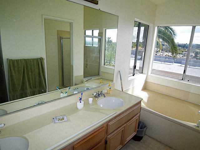 1630 Promontory Ridge Way Vista, CA 92081 - Photo 10 of 13 The master bath with dual sinks and a great view.
