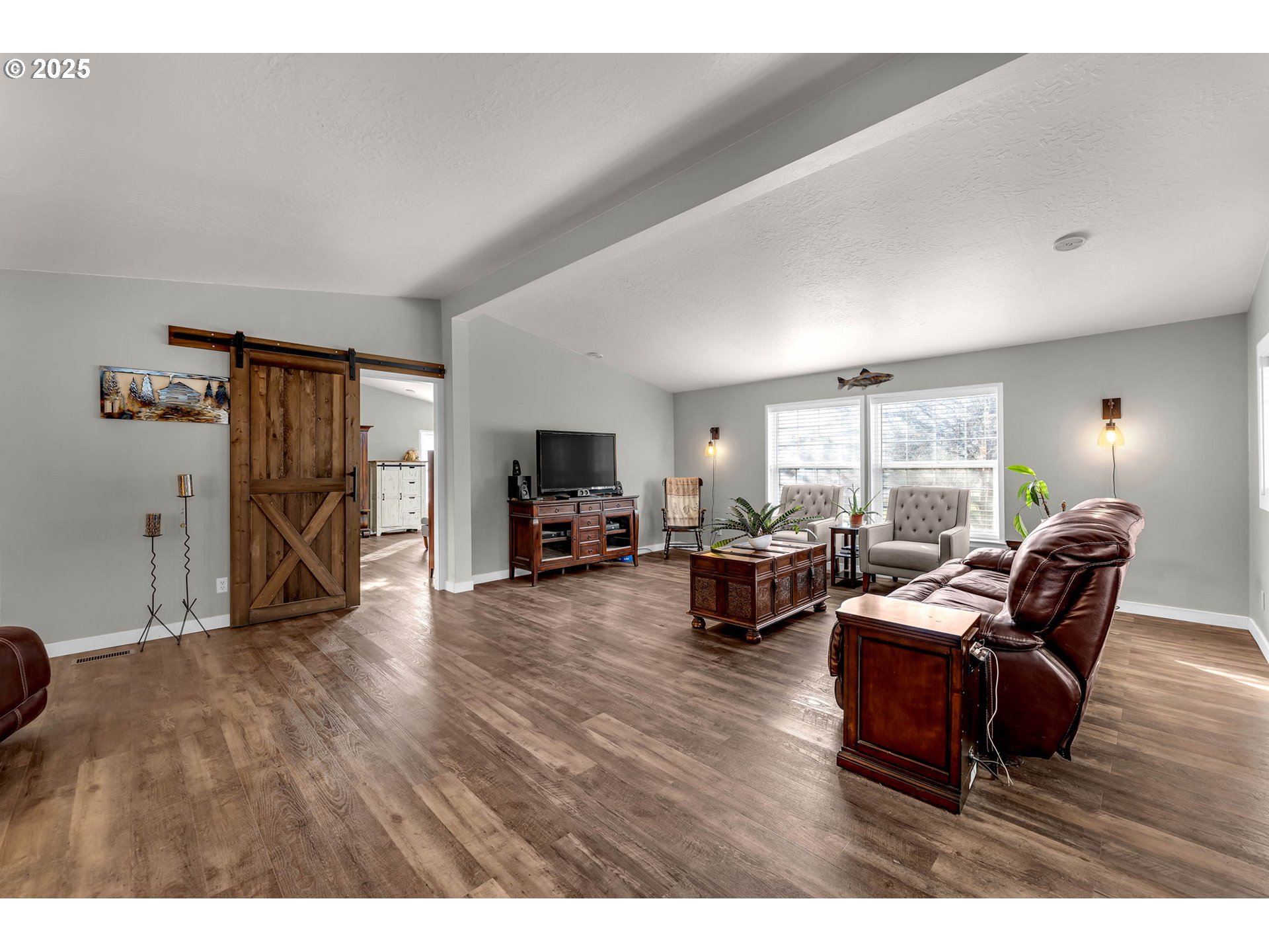 111 Mathany Road Carson, WA 98610 - Photo 14 of 39 a living room with furniture and a flat screen tv