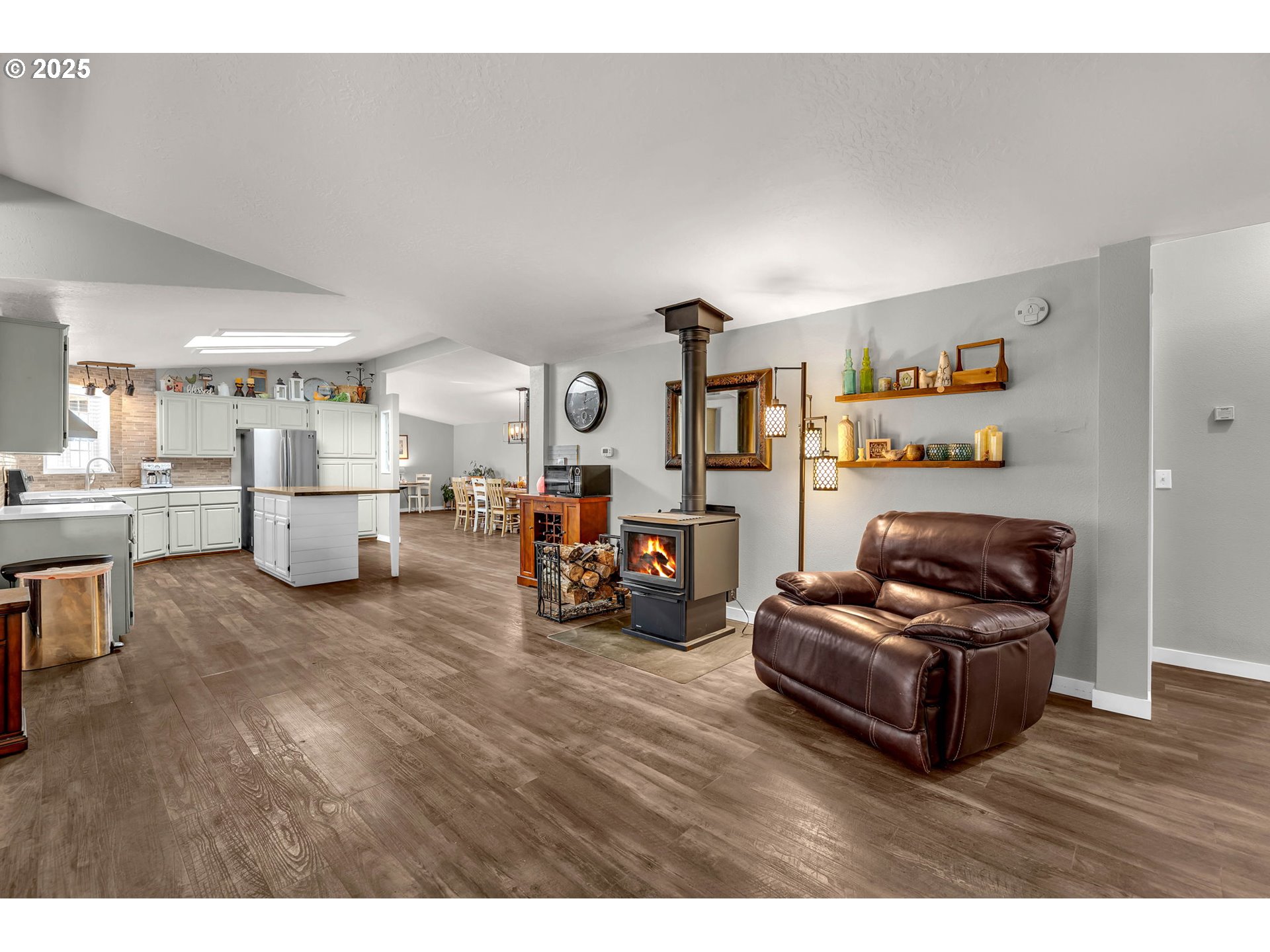 111 Mathany Road Carson, WA 98610 - Photo 17 of 39 a living room with furniture and a wooden floor