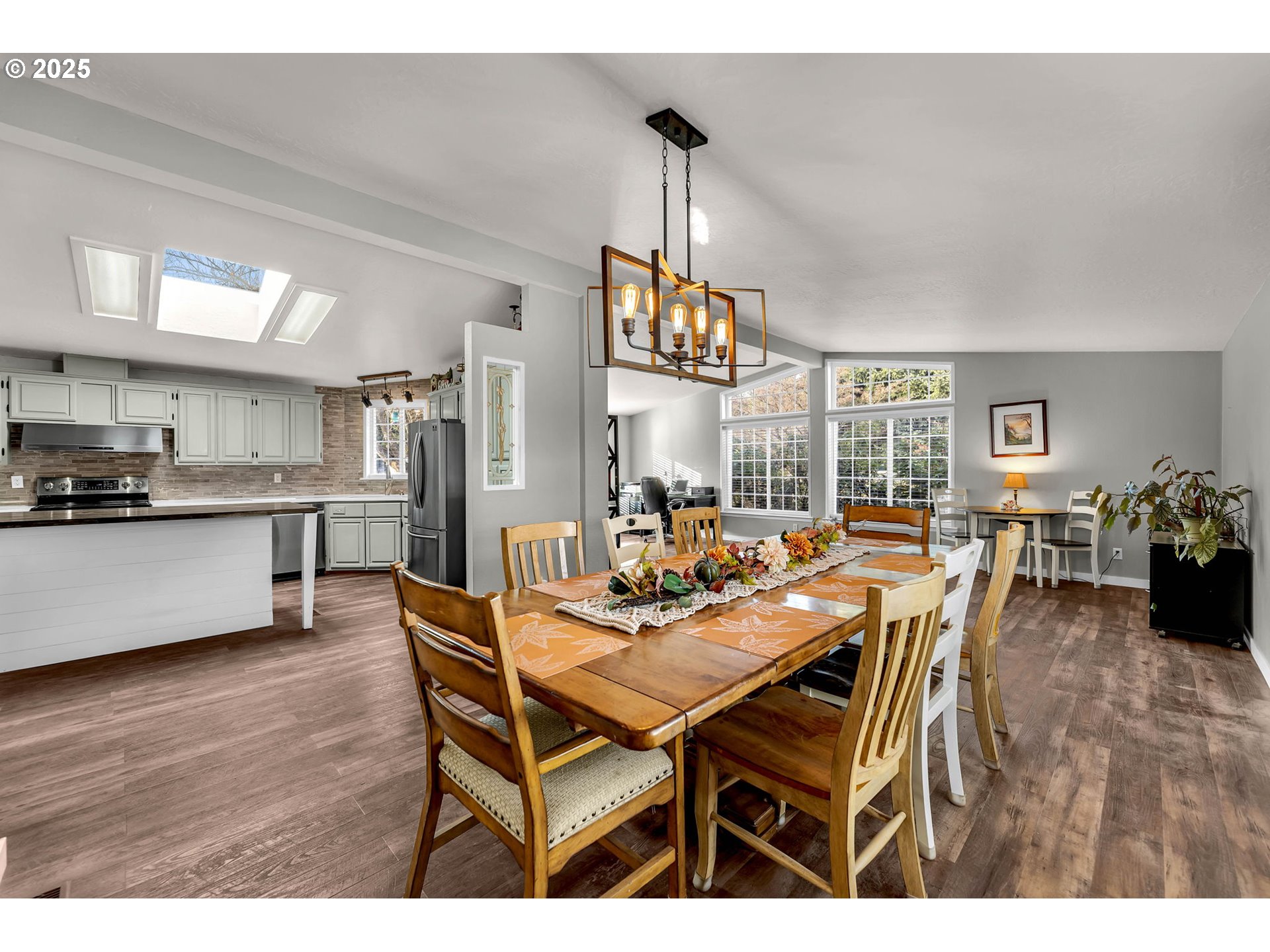 111 Mathany Road Carson, WA 98610 - Photo 18 of 39 a dining room with furniture and wooden floor